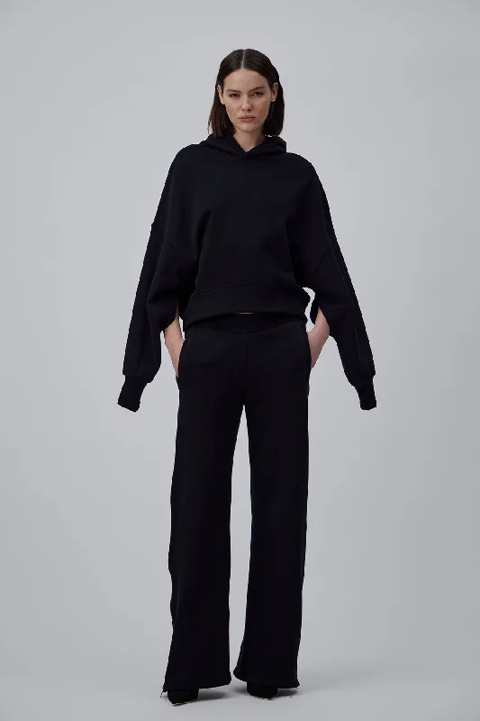 OVERSIZE JOGGER PANTS WITH ZIPPER ON THE SIDE IN GLOSSY BLACK Earthy Women's 